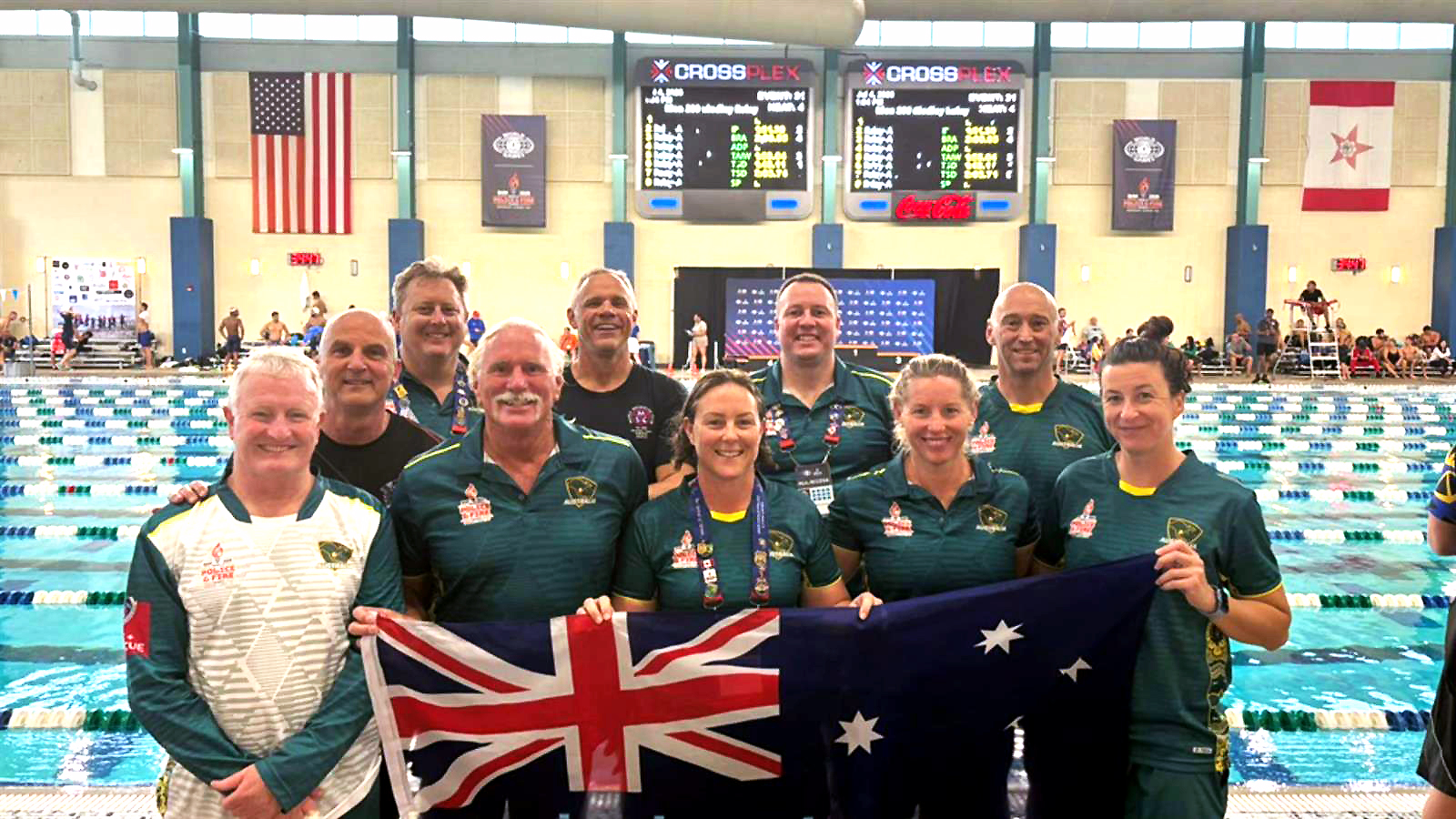 John Mangrum (front row, second from left) with the Australian swim team at this year's games